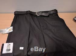 29 pairs of black trousers of varying sizes from 30S to 36L for work job lot