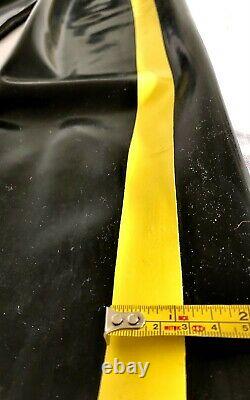 Mens rubber full length chaps with yellow stripe, 30/32 waist, 30 leg